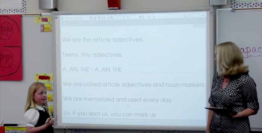  Student leading her class in a Shurley Jingle. 